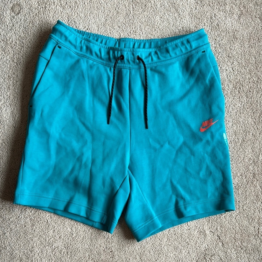 Nike Men's Teal Shorts with Red Logo
